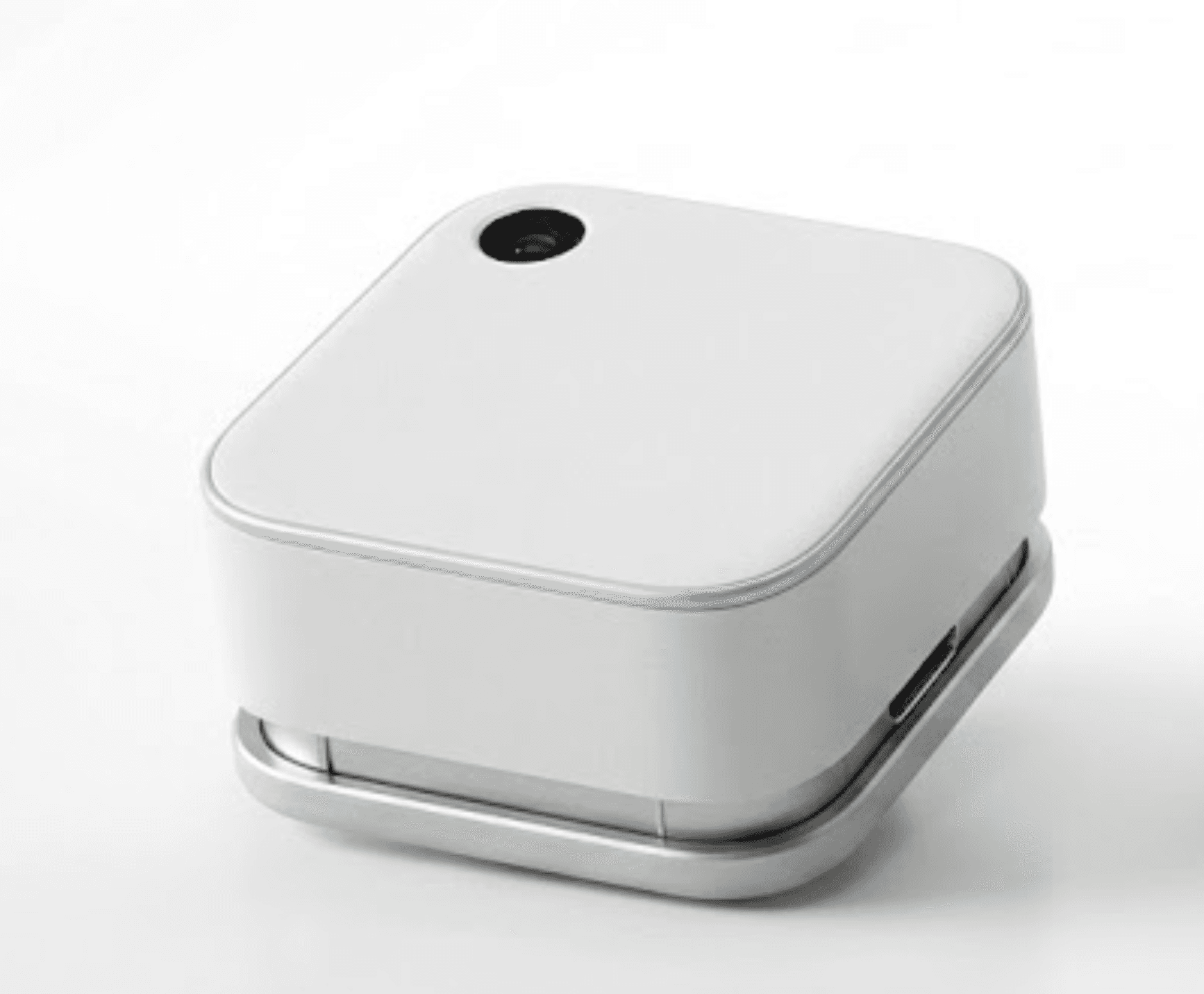 The closed Nevria Array pod — a clean white enclosure with a camera aperture and an ice-blue seam.